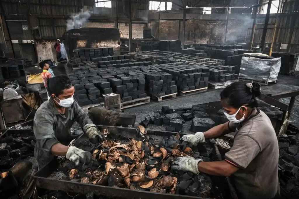 Indonesia coconut shell charcoal manufacturer producing coconut charcoal briquettes for export market
