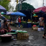 cara mengangkut sampah pasar